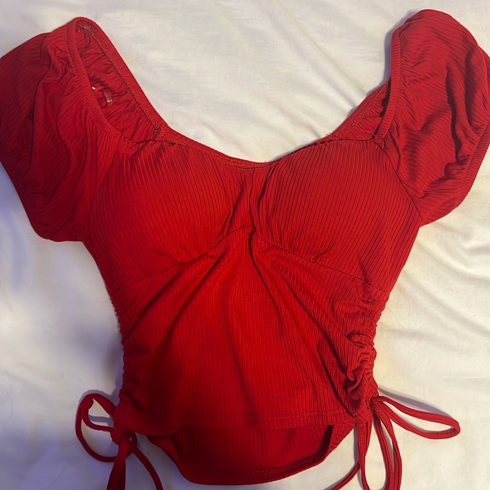 Red top with cinched sides